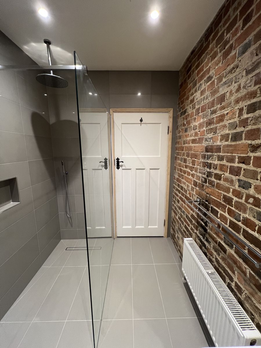 Walk-in shower by Optimum HVAC